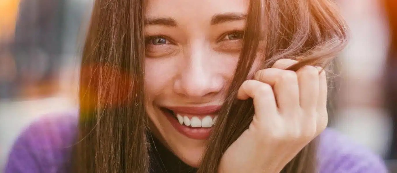 Lady smiling with healthy white teeth