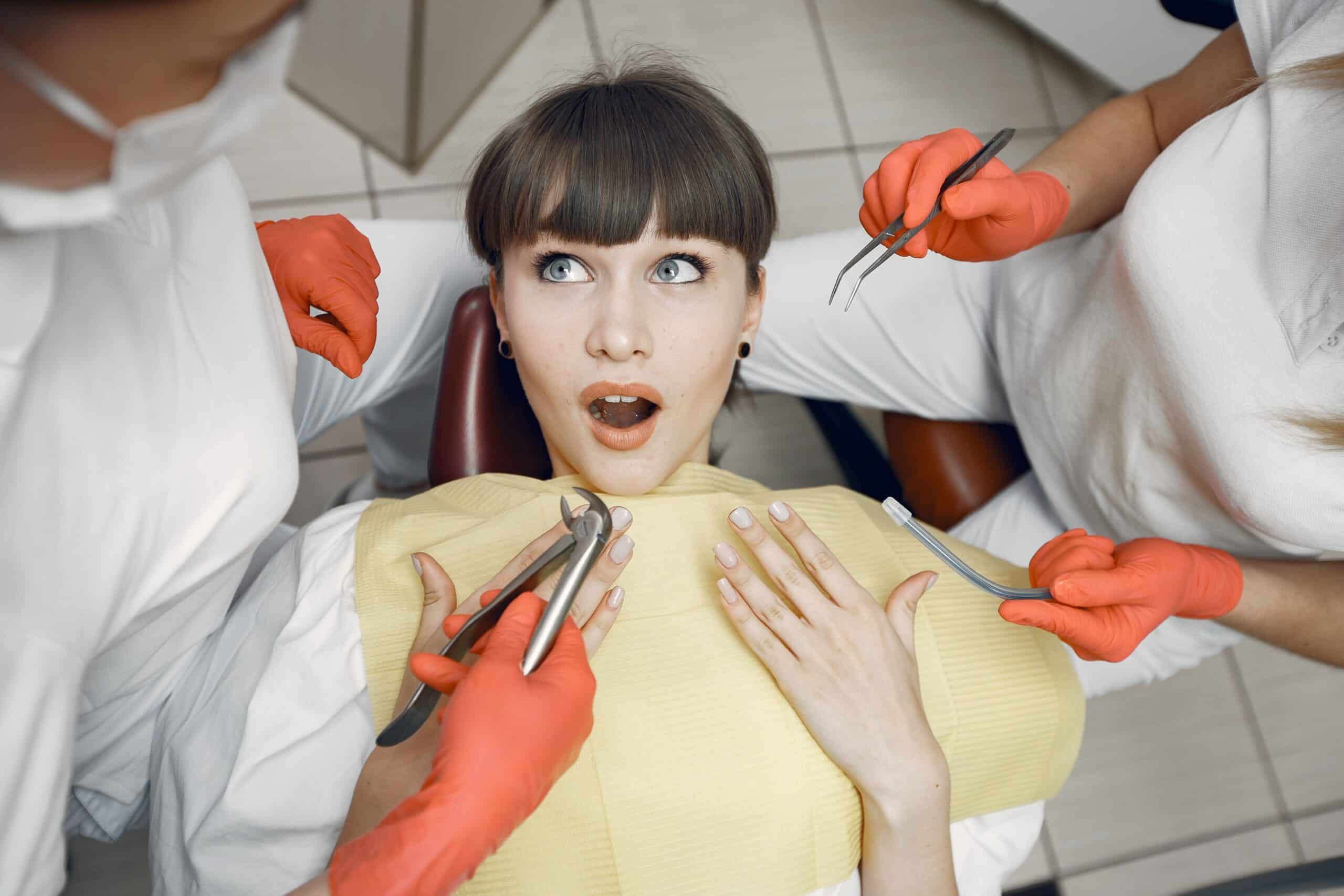 A stressed woman with dentists all around her