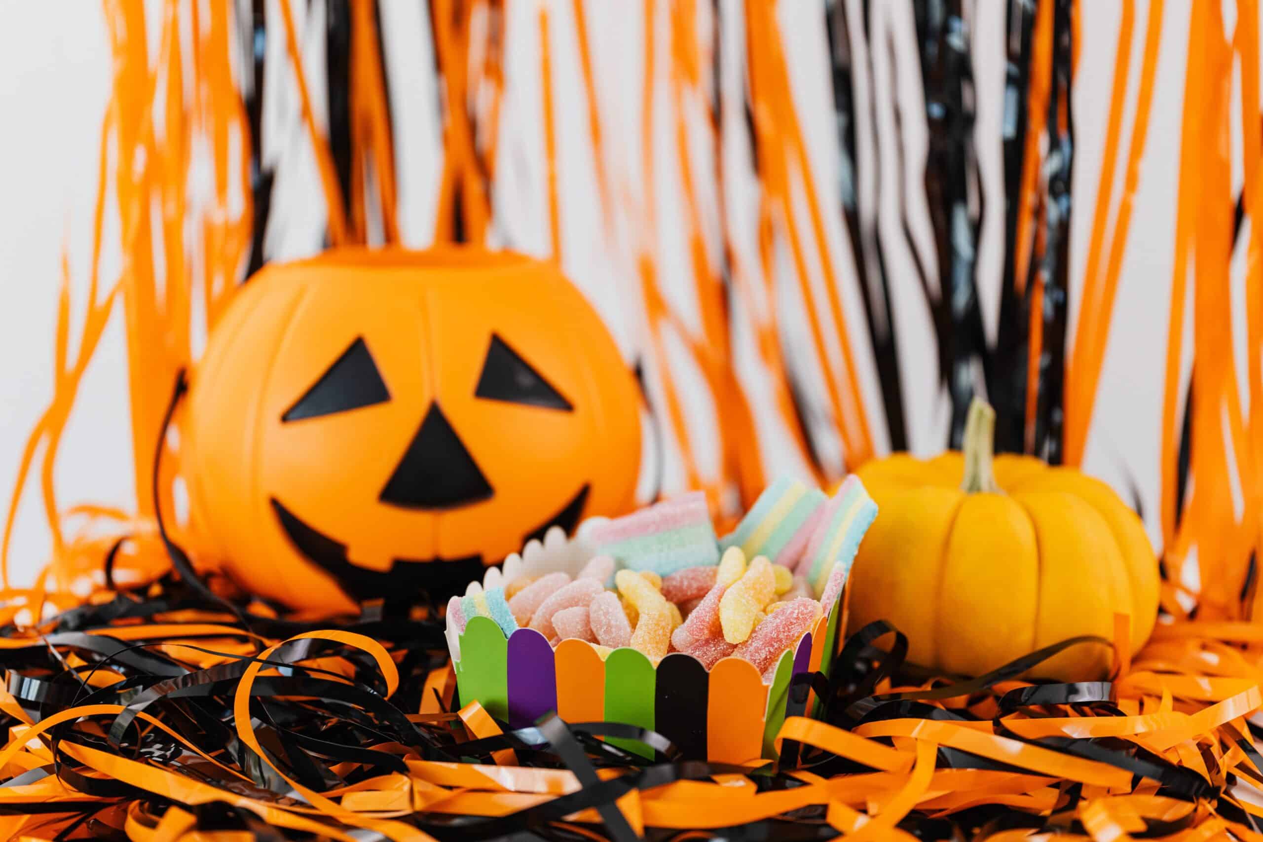 Halloween pumpkin and gummy sweets
